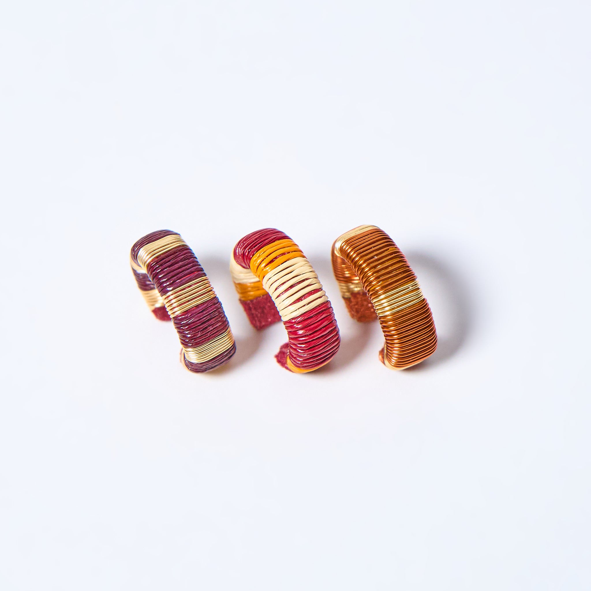 Handmade ear cuffs set striped in copper, gold, cream, mustard, orange, wine red and red