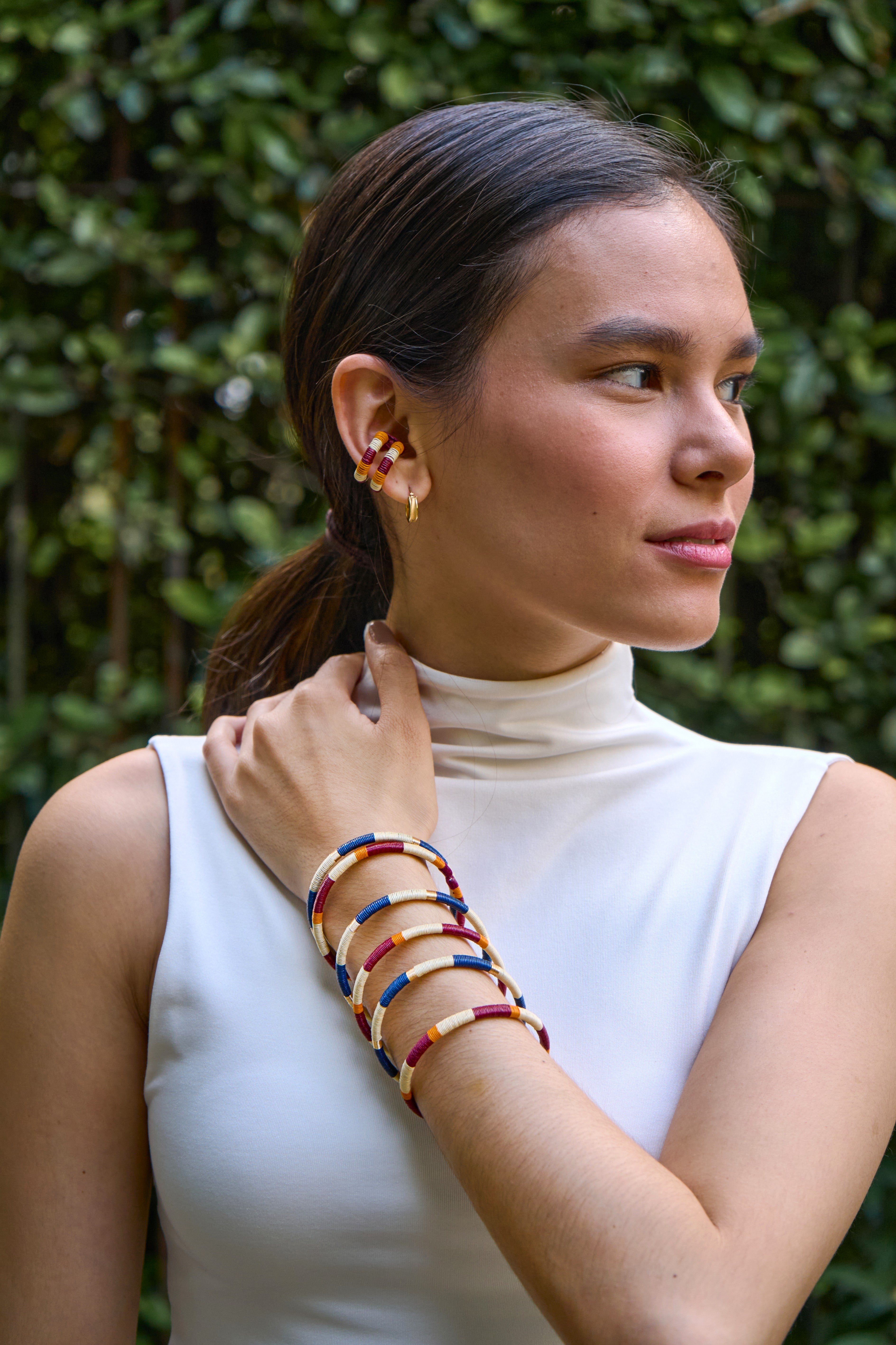 Model Set of  handmade striped bracelets in cream, copper, blue, wine and gold