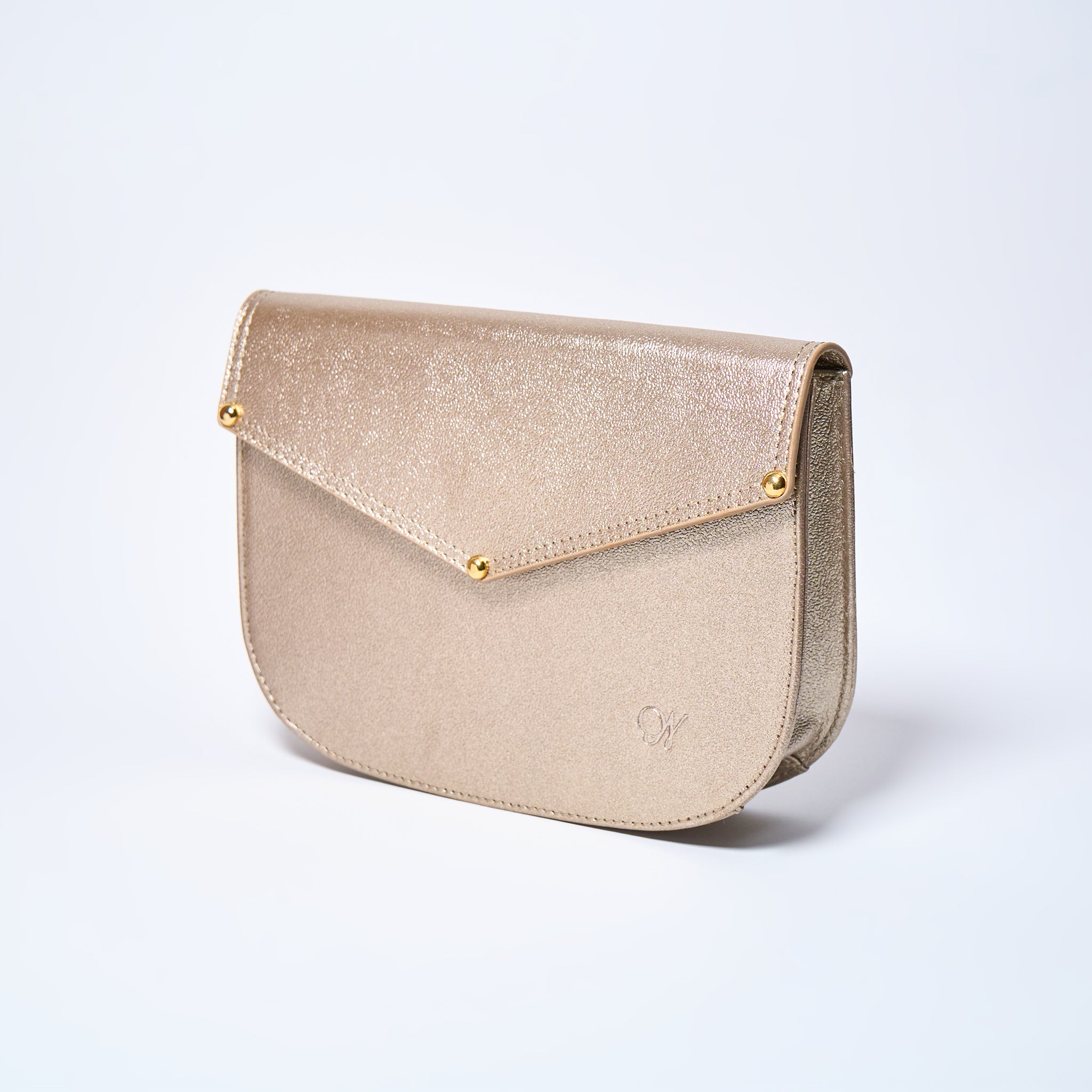 Lyra convertible leather crossbody bag in Stardust Gold with adjustable strap, can be worn as a shoulder bag, crossbody, or belt bag. Handcrafted by Oda Nova